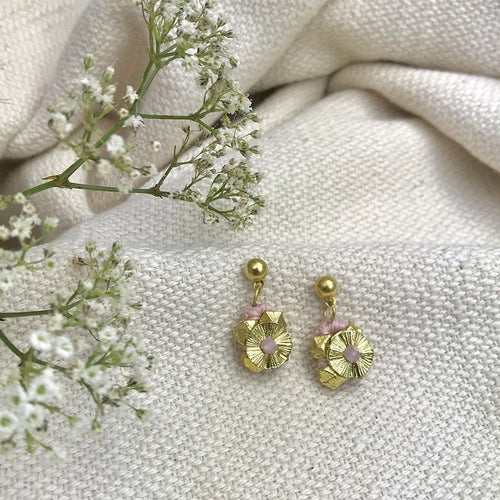 Pink flower earrings by Ariel featuring delicate floral design and lightweight metal hooks.