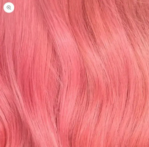 Pink Moni Afro Mohawk wig by Peach Clymene with bold kinky curly afro style, showcasing vibrant hair with textured curls.