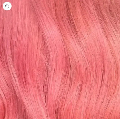 Pink Moni Afro Mohawk wig by Peach Clymene with bold kinky curly afro style, showcasing vibrant hair with textured curls.