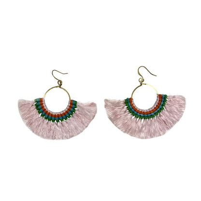 Pink tassel fan earrings by Ariel featuring vibrant, lightweight earrings with flowing tassels and fan-shaped design.