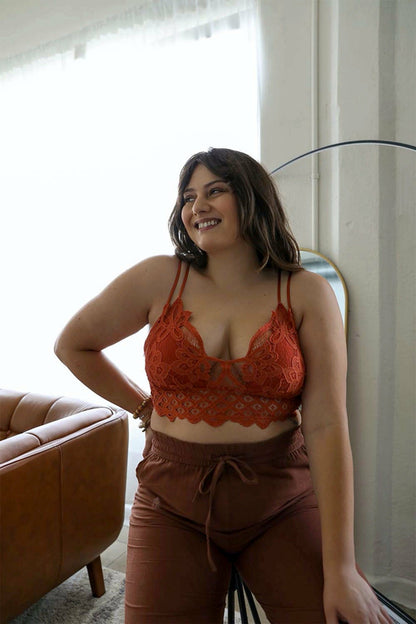 Rust-colored Plus Crochet Lace Longline Bralette by Periwinkle Aether, featuring intricate crochet lace and a longline design.