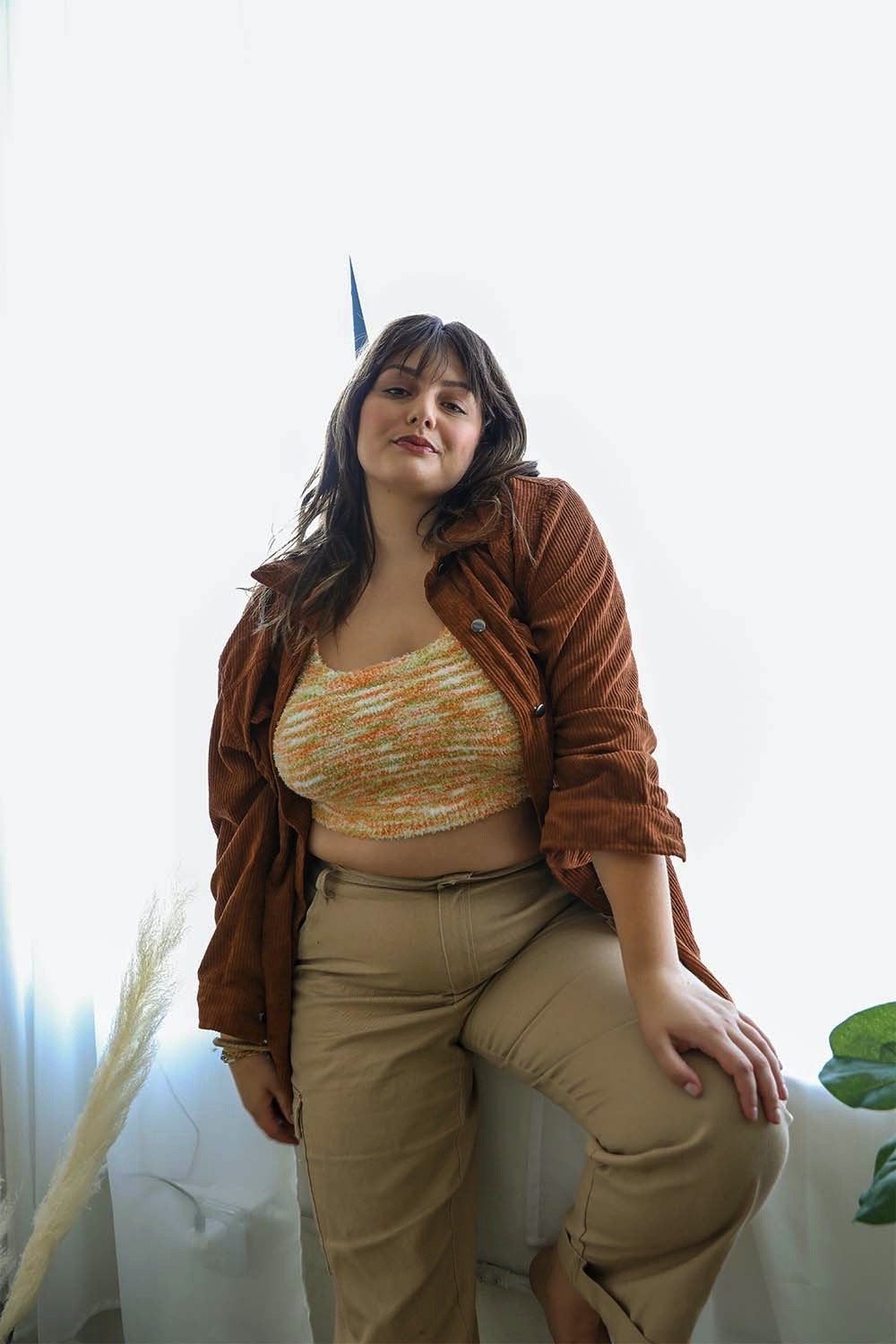 Plus-size Cozy Boucle Lounge Brami by Periwinkle Aether, orange tank top with a soft, textured boucle fabric and comfortable fit.
