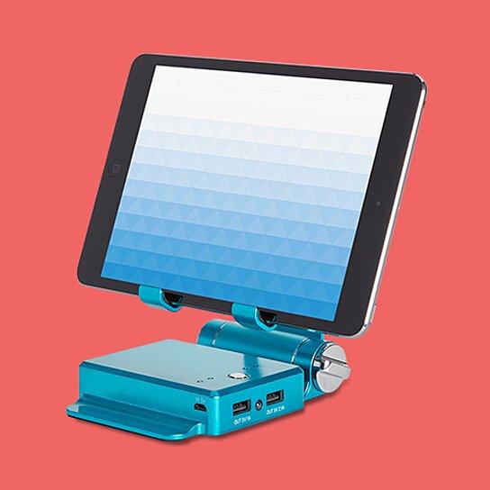 Salmon Lucky podium style stand with extended battery for iPad and iPhone, offering up to 200% battery boost, tech accessory.