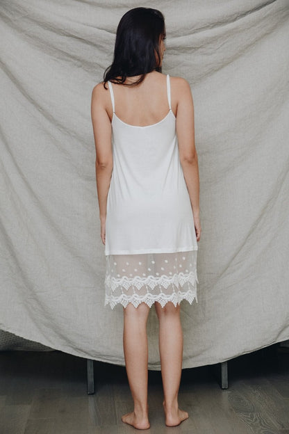 Polkadot lace slip dress by Periwinkle Aether featuring delicate lace and polka dot pattern, perfect for stylish summer wear.