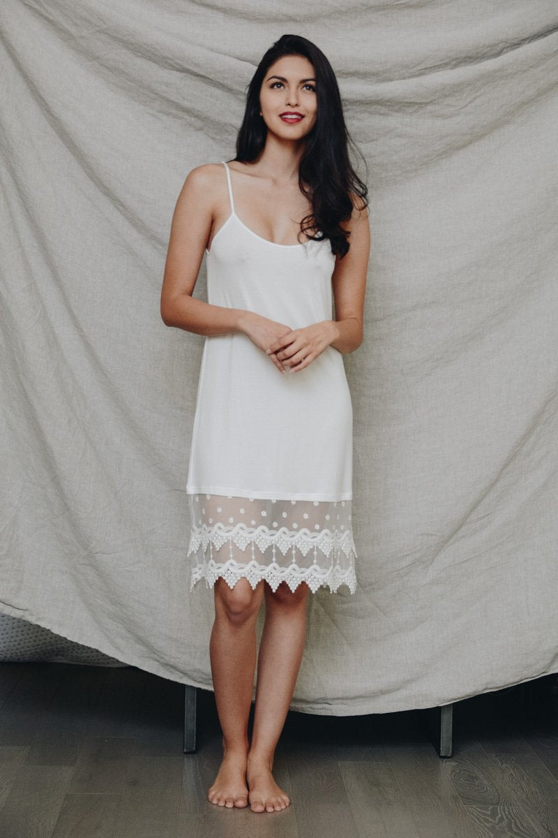 Ivory polkadot lace slip dress by Periwinkle Aether, featuring delicate lace and a flattering silhouette.