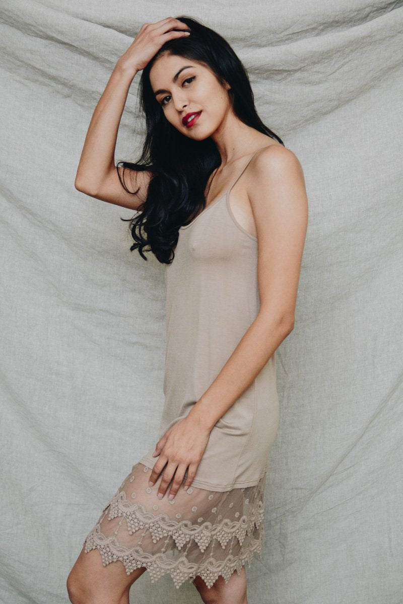Polkadot lace slip dress by Periwinkle Aether featuring mocha color and delicate lace details, perfect for stylish accessories.