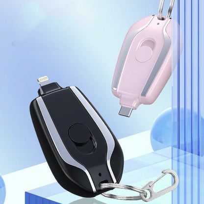 Cute mini Taupe Gaia portable rechargeable power bank with built-in plug, compact tech accessory for charging on the go.