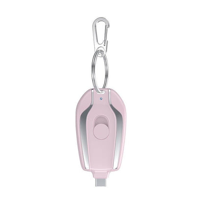 Taupe Gaia portable mini rechargeable power bank with built-in plug, compact tech accessory for on-the-go device charging.