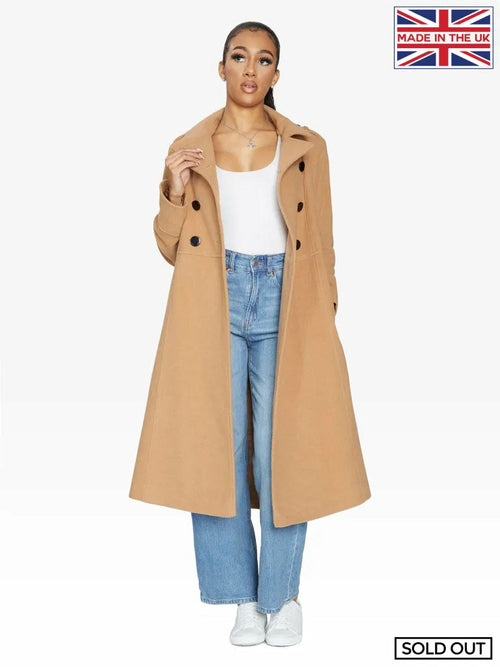 Camel A-Line double-breasted coat by Rose Eleusis, stylish jacket with classic design, shown on a model.