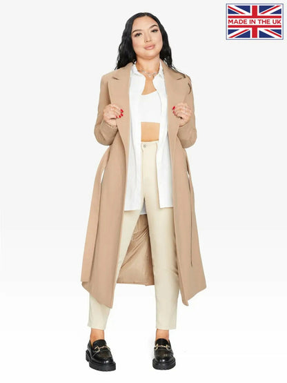 Camel belted longline duster coat by Rose Eleusis, stylish jacket with a belt and long silhouette in a modern design.