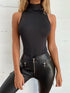 Black fitted sleeveless bodysuit with turtleneck, stylish Grey Beech jumpsuit, close-up image showing fabric and fit details.