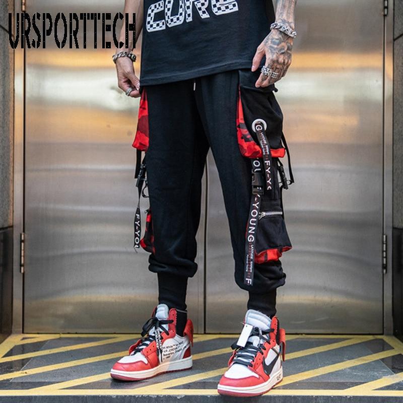 Grey Beech Letter Ribbons cargo pants showing relaxed fit, multiple pockets, and stylish design on neutral background.