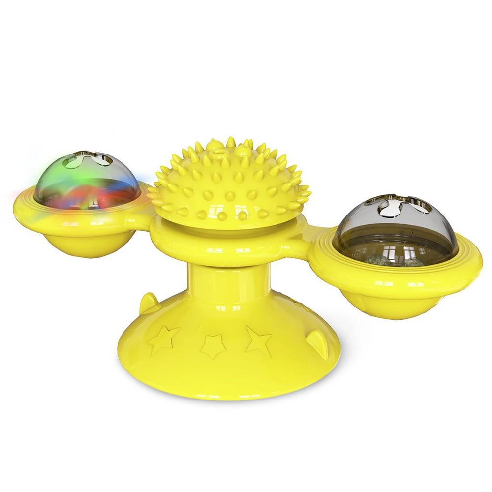 Cats playing with Yellow Pandora Whirling LED Balls, colorful pet toy for cats, featuring spinning LED lights.