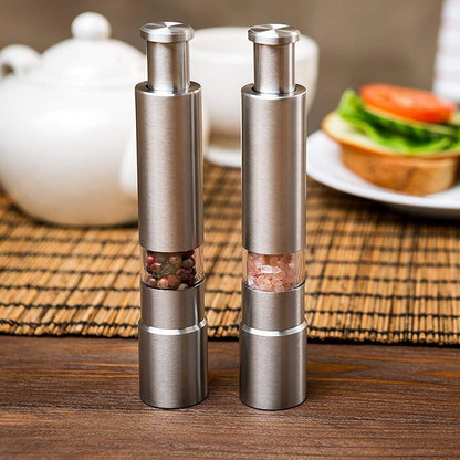 Yellow Pandora premium stainless steel salt and pepper spice grinder for kitchen use, featuring a sleek modern design.