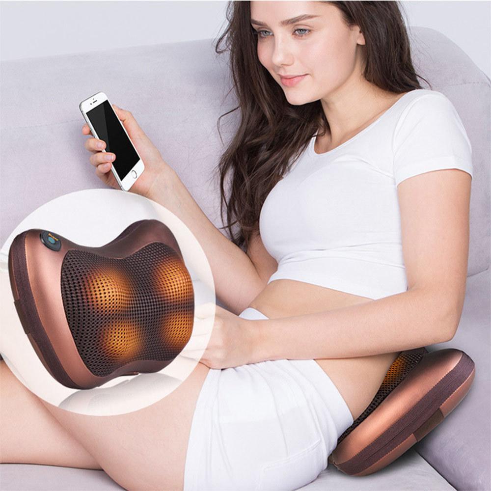 Yellow Pandora portable 4-head massage pillow for healthcare, showing soft, cushioned surface with adjustable straps and massage nodes.