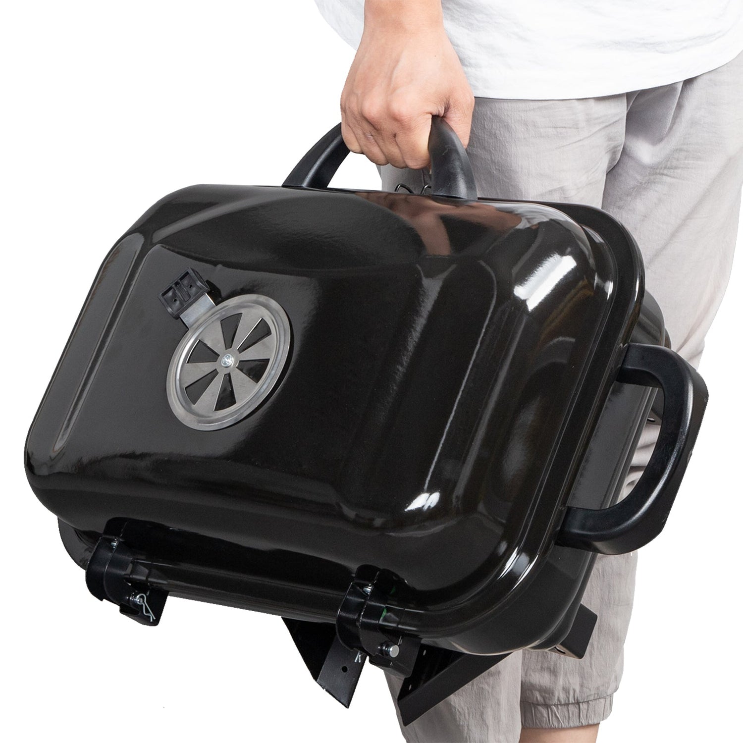 Yellow Pandora portable tabletop charcoal grill for kitchen use, showing compact design and grilling surface in the image.