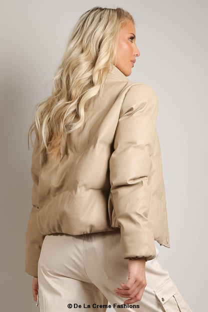 Rose Eleusis PU boxy puffer jacket displayed on a hanger, showcasing its quilted design and cropped, oversized fit.