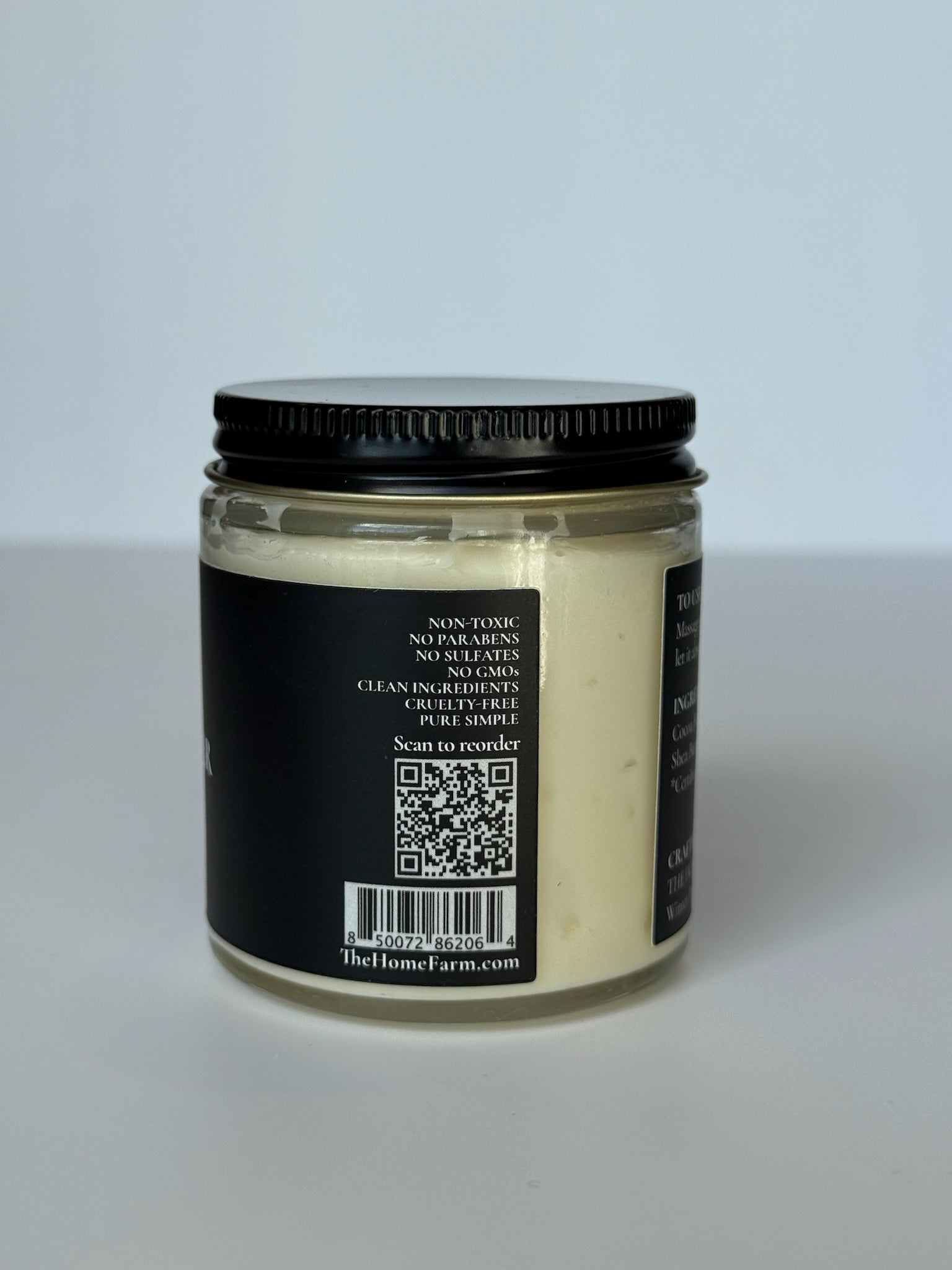 Creamy DC-The Home Farm Magnesium Body Butter jar, smooth texture, and natural ingredients for nourishing skin.