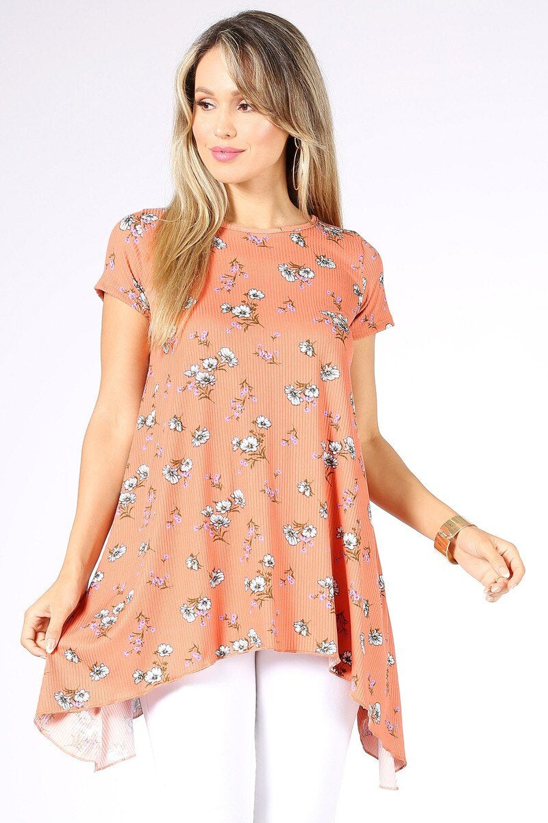 Floral print asymmetrical tunic with short sleeves for women by Burgundy Daisy, showcasing vibrant floral pattern and stylish design.