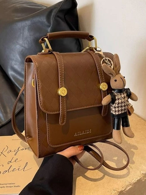 Taupe Gaia quilted flap backpack bag for women with stylish design and adjustable straps, perfect for everyday use.