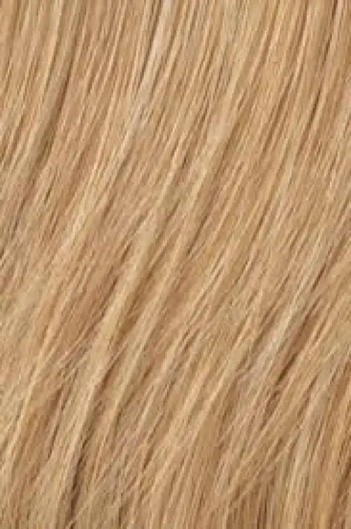 Peach Clymene 18-inch ginger blonde human hair highlight clip-in extensions, three-piece hair enhancement for added volume and color.