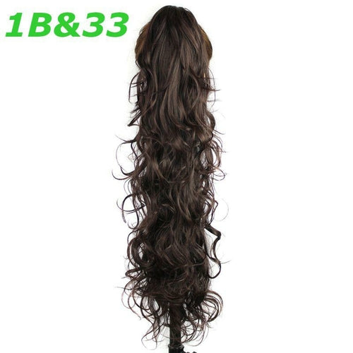 Curly wavy synthetic hair clip-in ponytail by Blue Charlie, featuring a claw clip for easy attachment and natural appearance.