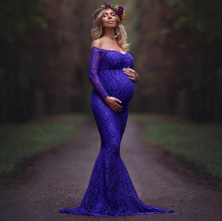 Blue Charlie maternity fitted lace wedding gown for bridal photos, featuring elegant lace details and a comfortable fit for expectant mothers.