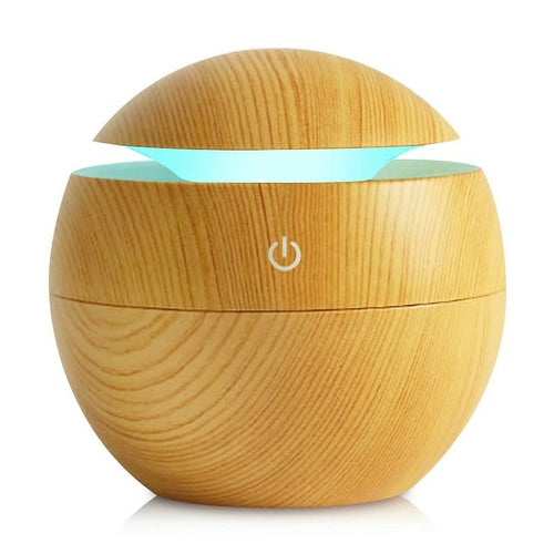 Jade USB ultrasonic cool mist humidifier and air purifier with 7 color-changing LED lights, designed for modern home use