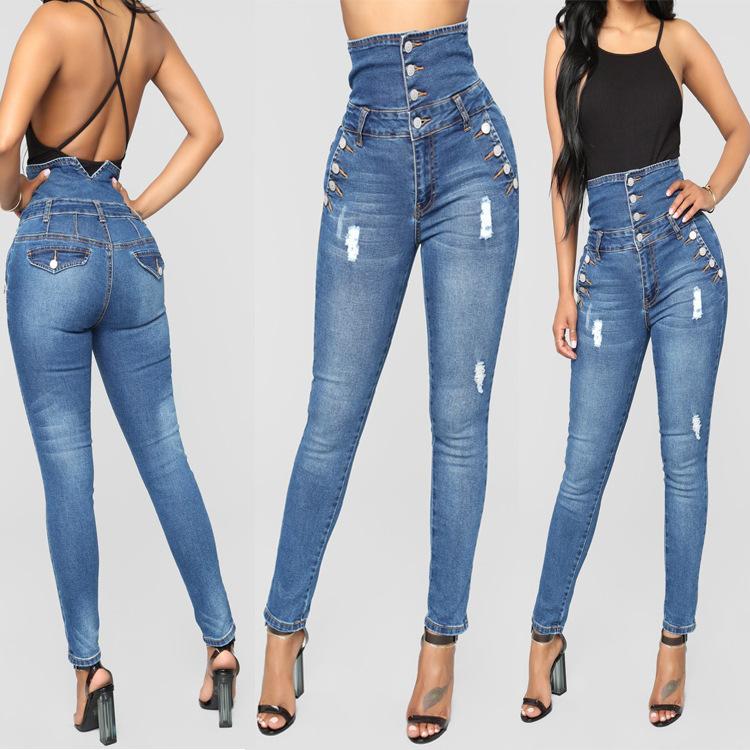 Blue Charlie high waisted vintage fashion jeans with a skinny fit, displayed on a model showcasing their stylish design.