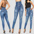Blue Charlie high waisted vintage fashion jeans with a skinny fit, displayed on a model showcasing their stylish design.