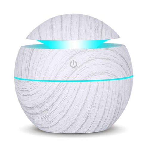 Jade USB ultrasonic cool mist humidifier with 7-color LED change, designed for air purification and soothing home atmosphere