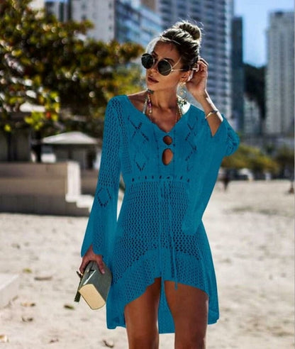 Women’s crochet beach cover-up with tassel tie detail, knitted fabric, Jade brand, perfect for stylish beachwear.