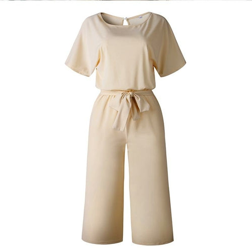 Women’s short sleeve jumpsuit by Blue Charlie featuring wide-leg design and solid color, perfect for summer fashion.