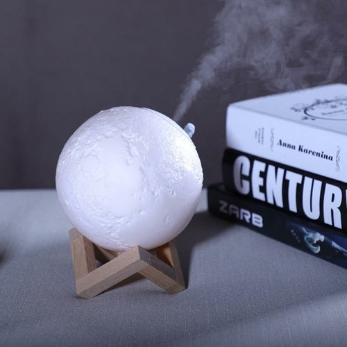 Portable KBAYBO 880ML USB ultrasonic air humidifier with Jade branding, shown in use on a woman&