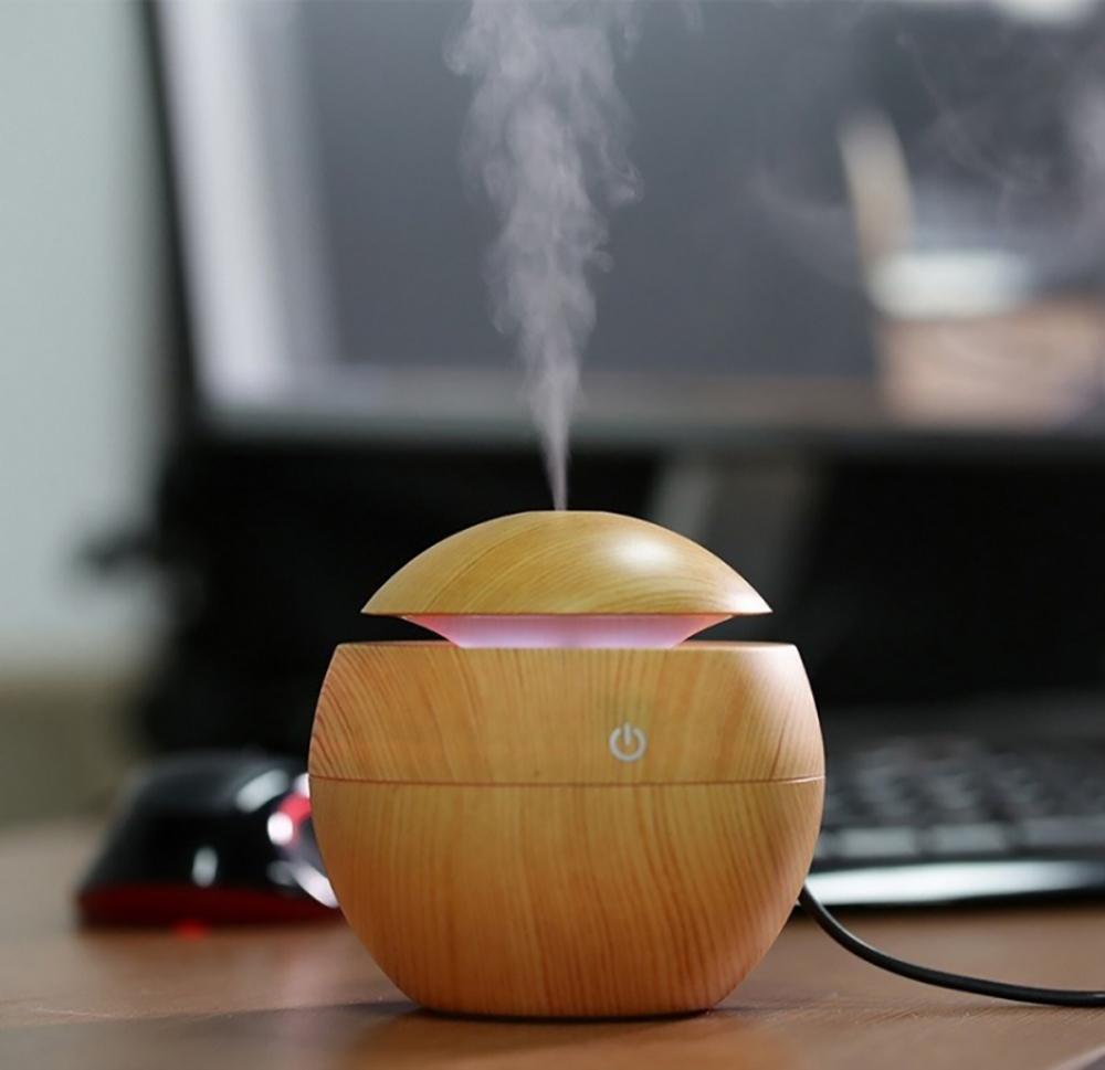 Jade USB ultrasonic cool mist humidifier with 7 color-changing LED lights, designed for home air purification and moisture.