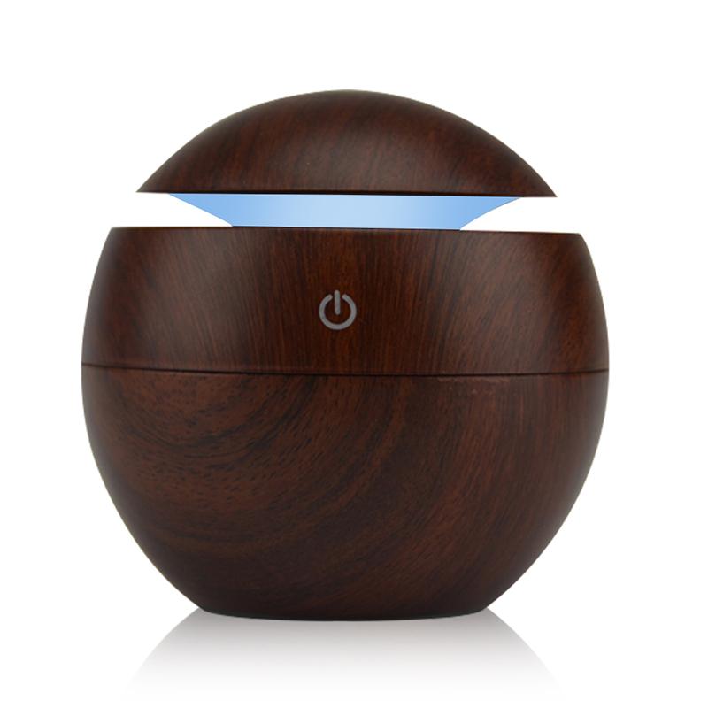 Jade USB ultrasonic cool mist humidifier with 7-color LED lights, designed for improving air quality and adding ambiance.