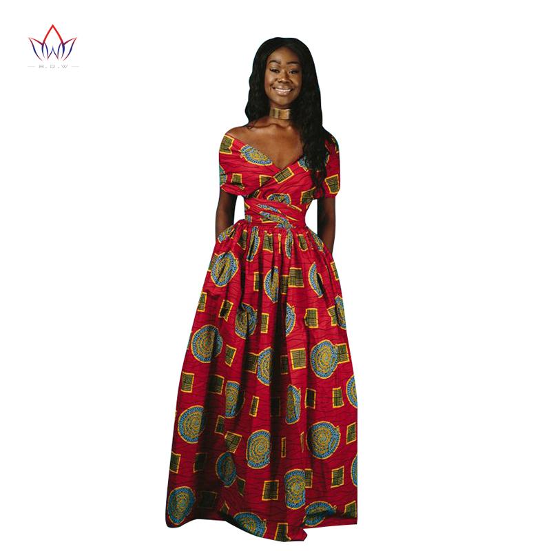 Long African dashiki dress for women, traditional African clothing in vibrant patterns, by Blue Charlie, suitable for home and garden wear.