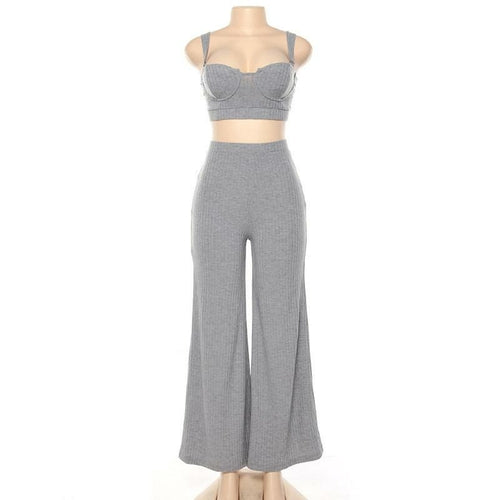 White two-piece knitted tracksuit for women by Blue Charlie, sleeveless strapless crop top and matching pants.