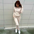 Women’s wine-colored autumn and winter sport suit by Blue Charlie, featuring a cozy pullover top and matching tracksuit pants.