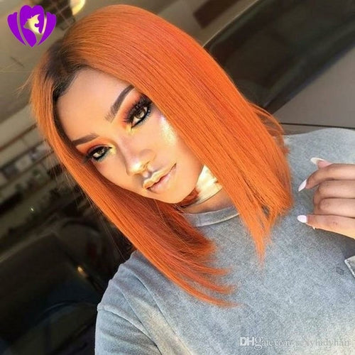 Black roots ombre orange short bob wig from Blue Charlie, Brazilian style, with natural-looking hair and layered cut.
