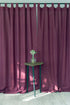 Dark plum linen curtain with tab top design from Magenta Sugarplum, showing the textured fabric and stylish window treatment.