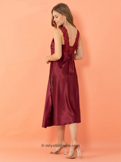 Red high slit nightie dress by Harlequin Icarus, flowing fabric, sleeveless design, perfect for elegant evening wear.