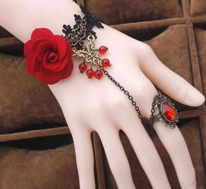 Red Rose Bracelet by Burgundy Uranus featuring a delicate red rose charm and adjustable chain, stylish jewelry accessory.