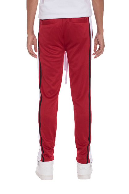 Red Lime Milo tricot sweat pants with a relaxed fit, featuring an elastic waistband and soft fabric for casual comfort.