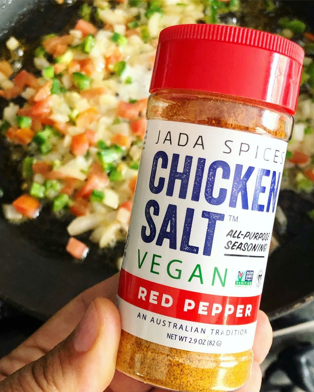 Amethyst Lelantos Chicken Salt Hot and Sour Combo Pack with red pepper flakes in a clear container on a white background.