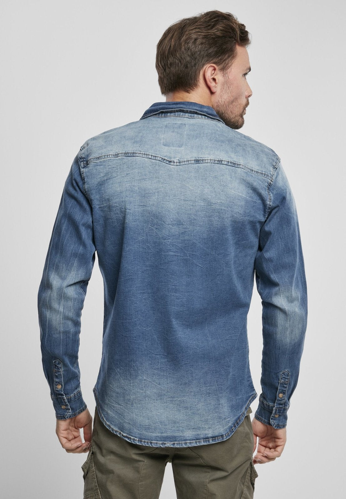 Callisto Riley denim shirt for men, featuring classic denim design and button-up style, shown in the image.