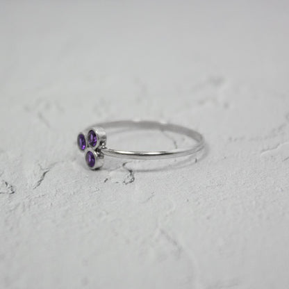 Sterling silver ring featuring a vibrant amethyst cluster gemstone, stylish jewelry piece from Grey Clymene.
