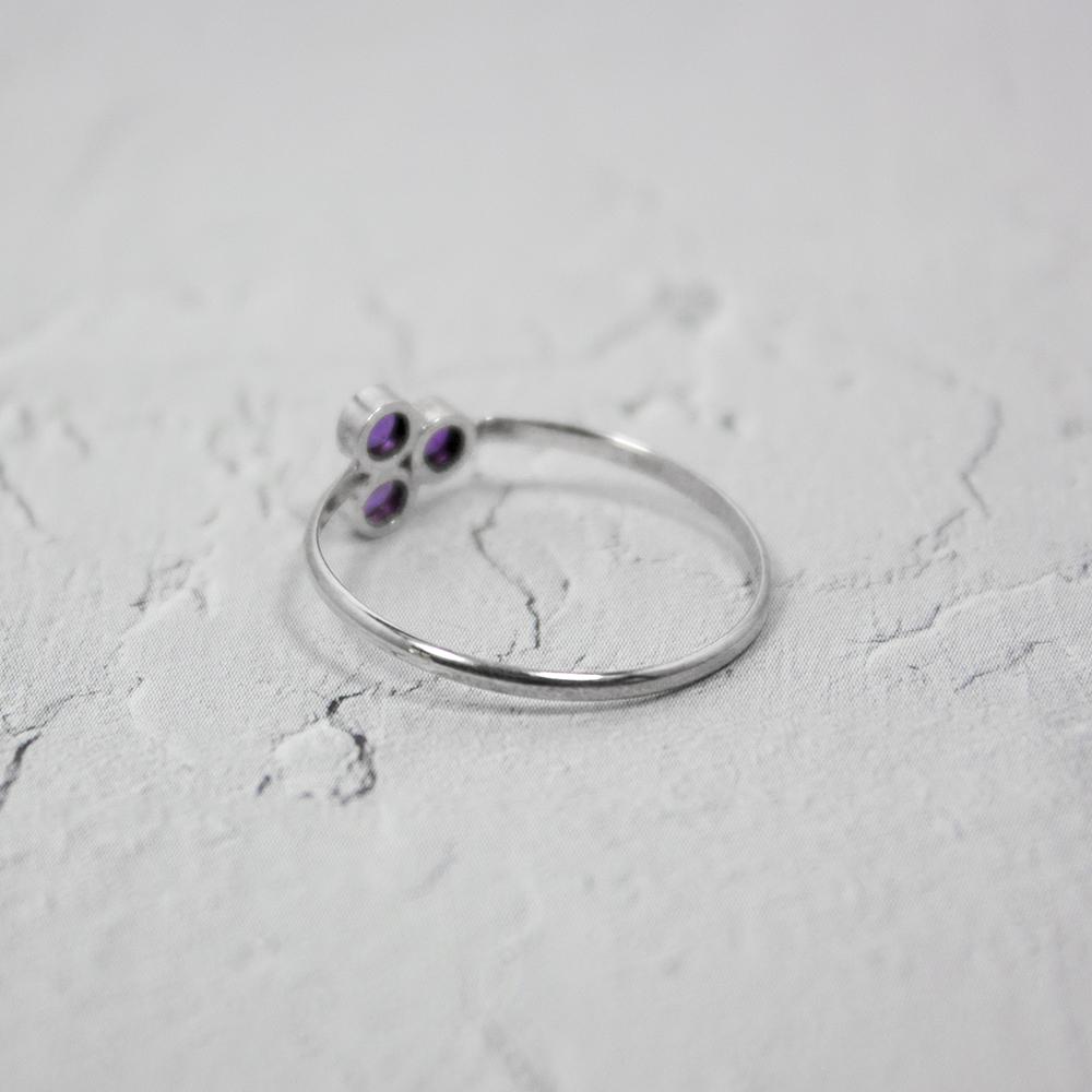 Sterling silver ring featuring a vibrant amethyst cluster gemstone, designed by Grey Clymene in jewelry and watches collection.