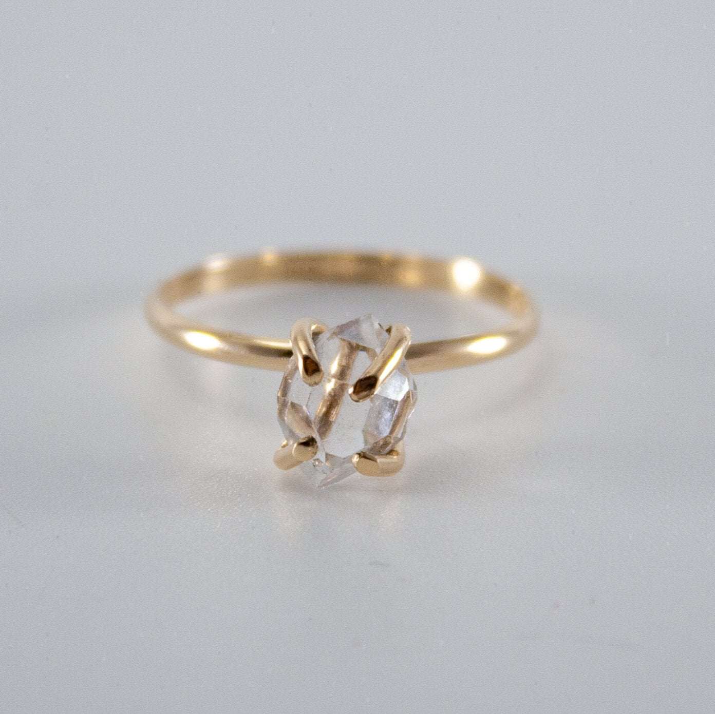 Raw Herkimer Diamond 14k gold-filled prong ring featuring a sparkling raw diamond set in a delicate gold band.