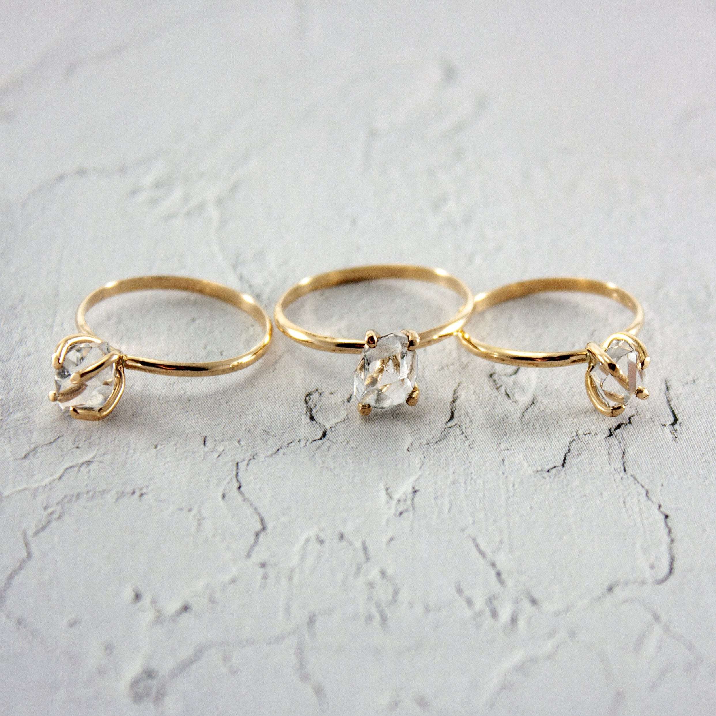 Raw Herkimer Diamond 14k Gold Filled Prong Ring showcasing a sparkling raw diamond in a gold setting.